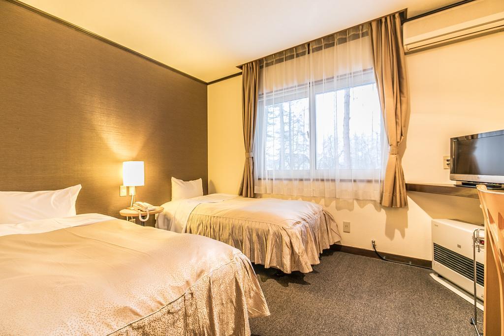 Petit Hotel Enchante Хакуба Екстериор снимка