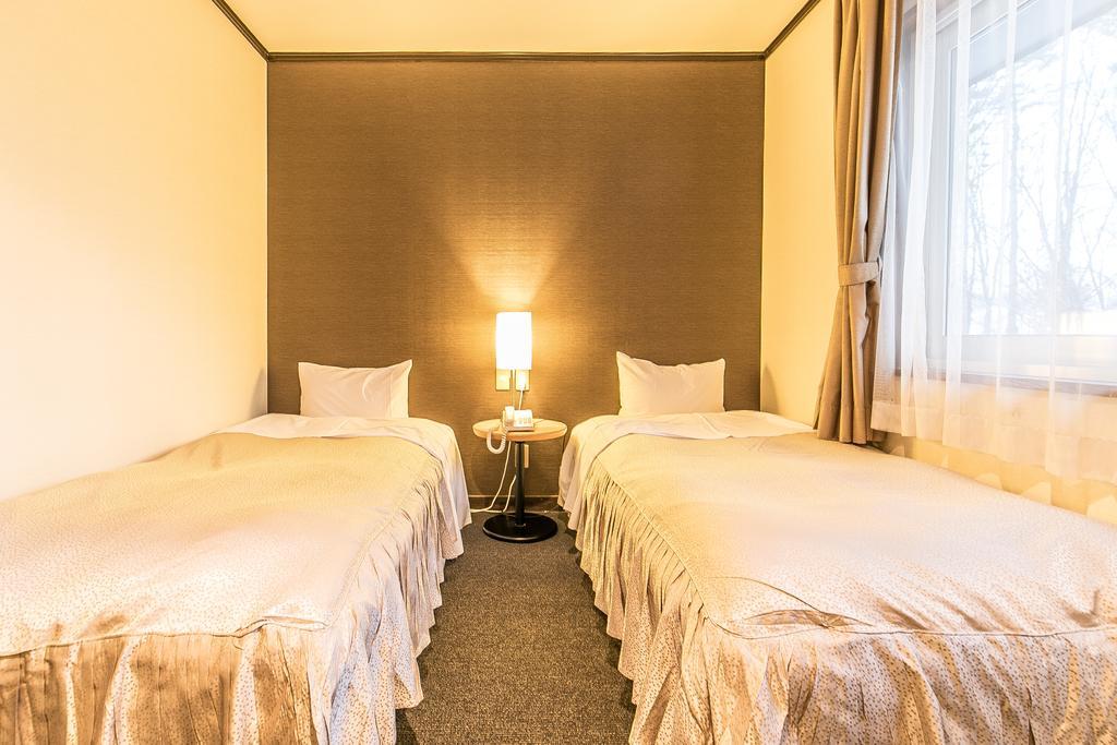 Petit Hotel Enchante Хакуба Екстериор снимка