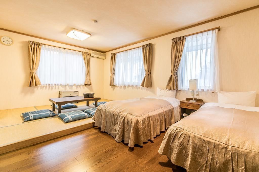Petit Hotel Enchante Хакуба Екстериор снимка