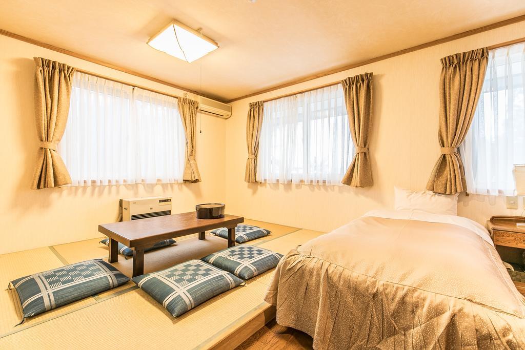 Petit Hotel Enchante Хакуба Екстериор снимка