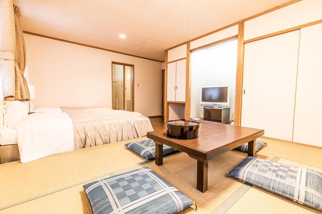 Petit Hotel Enchante Хакуба Екстериор снимка
