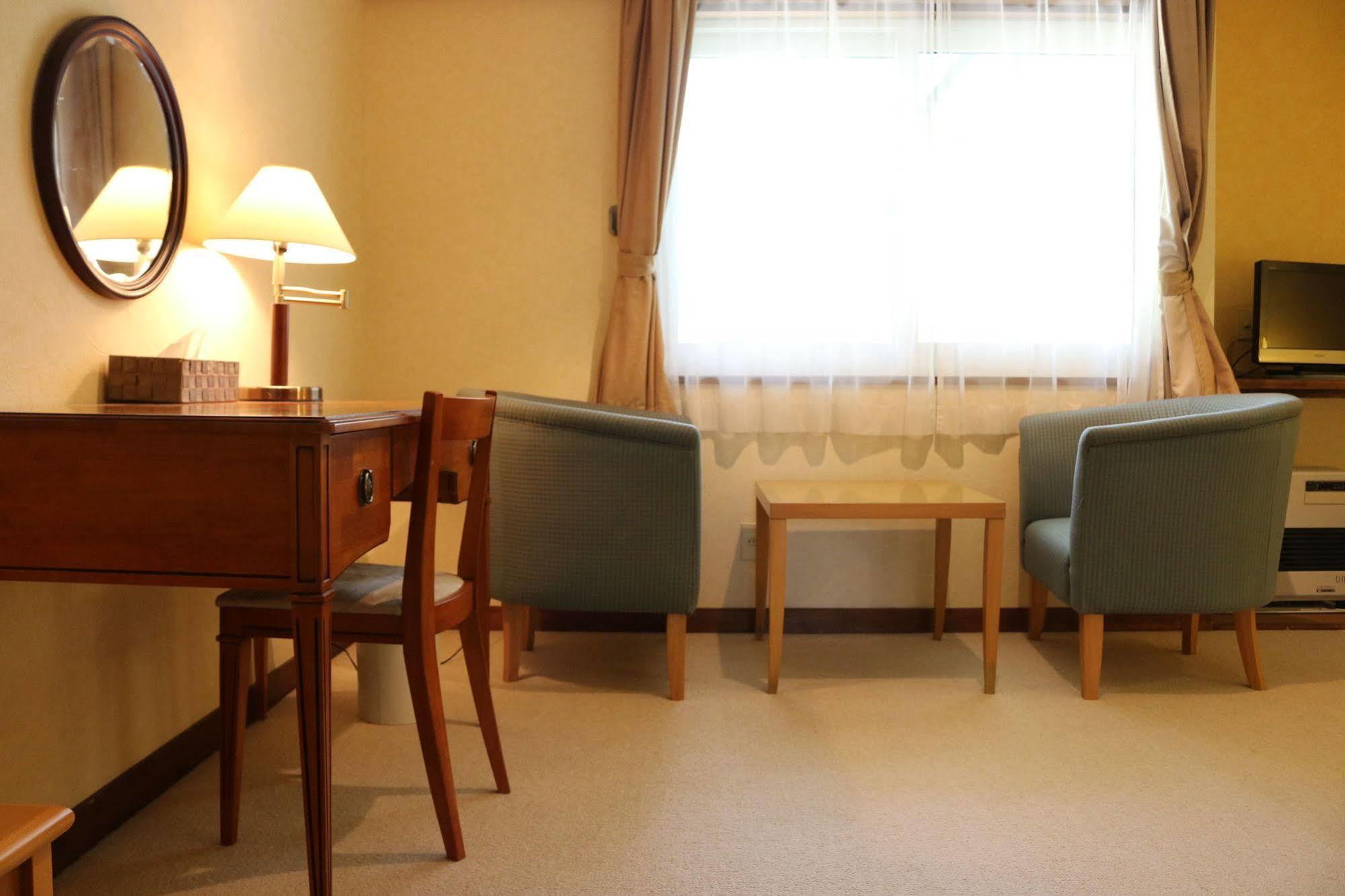 Petit Hotel Enchante Хакуба Екстериор снимка