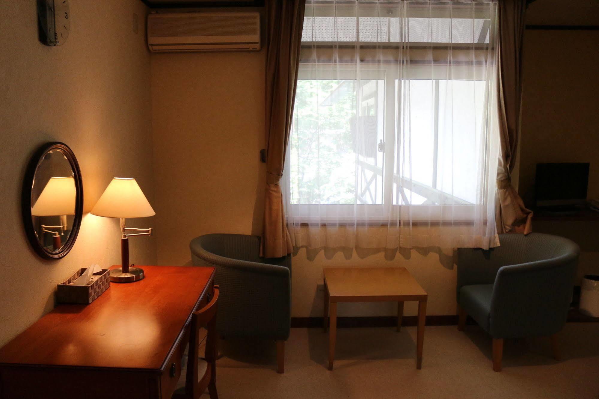 Petit Hotel Enchante Хакуба Екстериор снимка